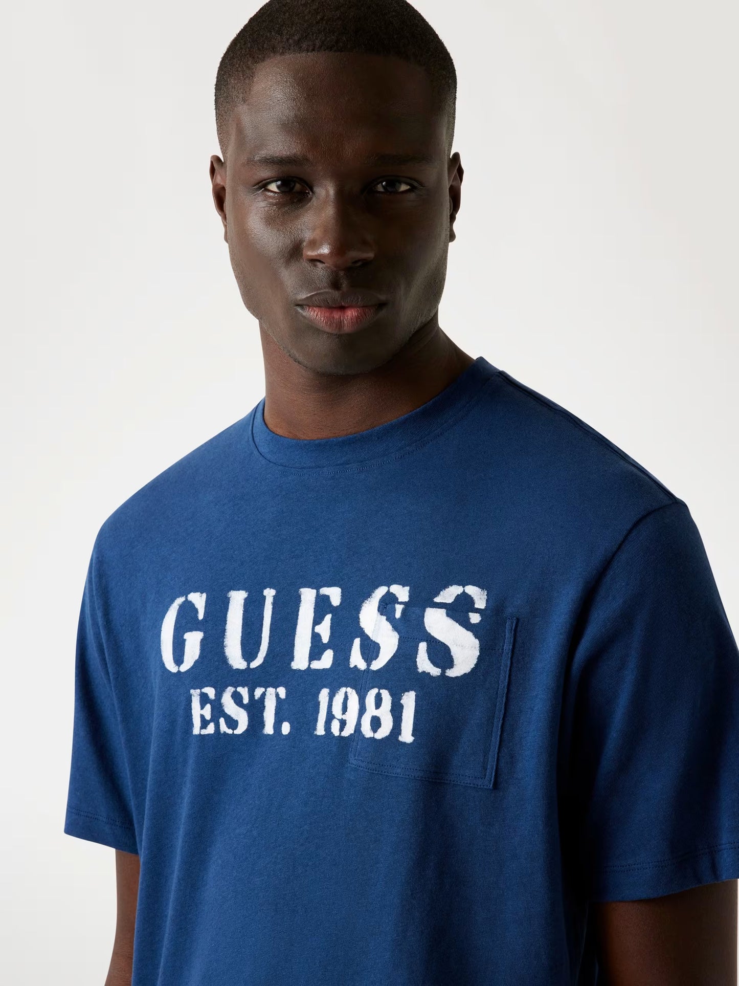 GUESS T-shirt basica con logo azzurra GUESS